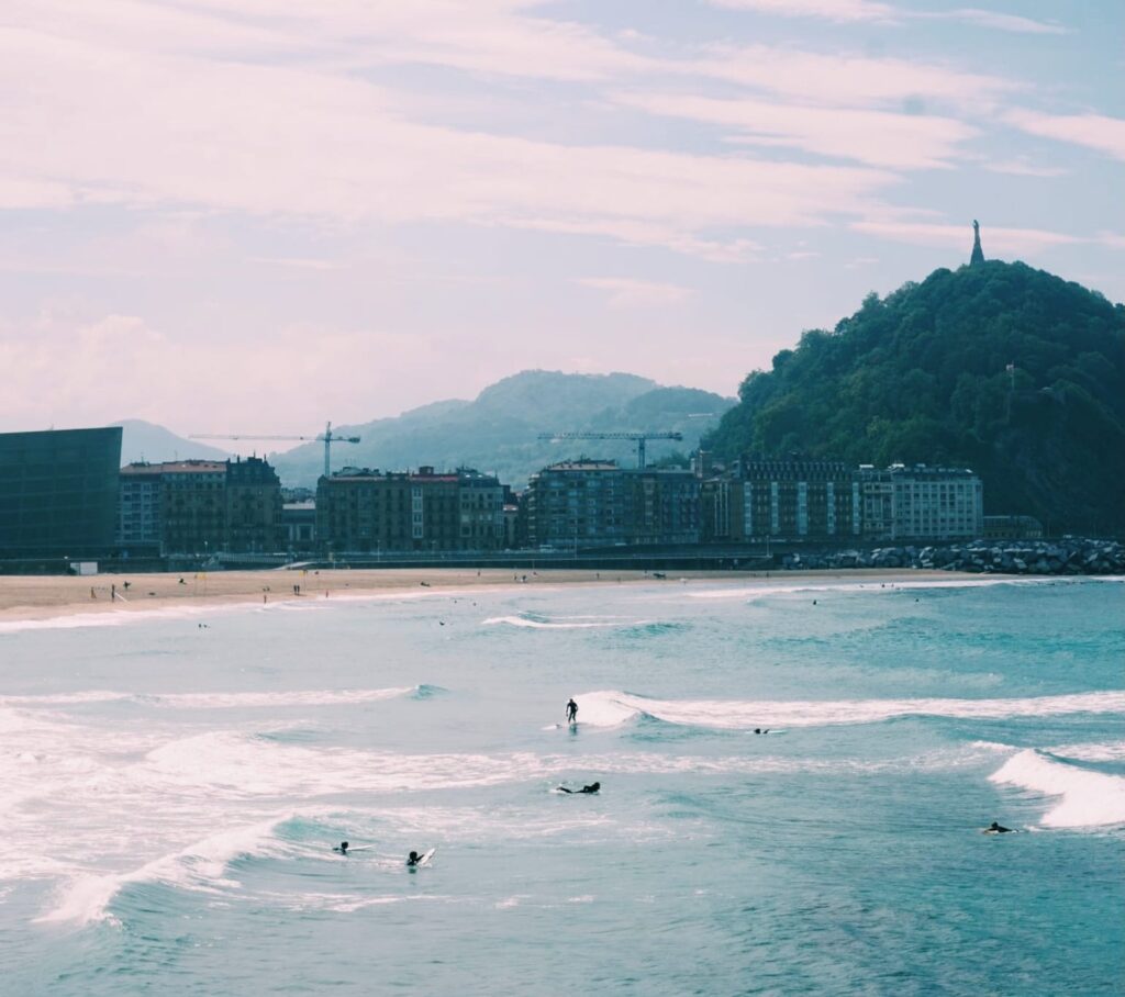 Surfing at the beach in San Sebastián.