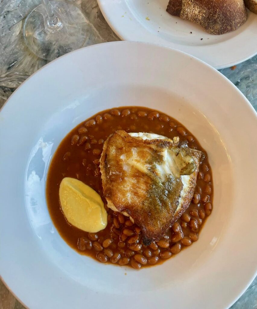 Pan fried hake with lobster baked beans at Angela's in Margate
